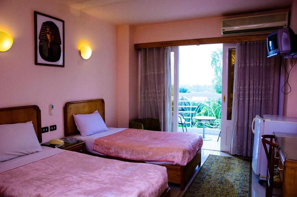New Pola Hotel Луксор Экстерьер фото