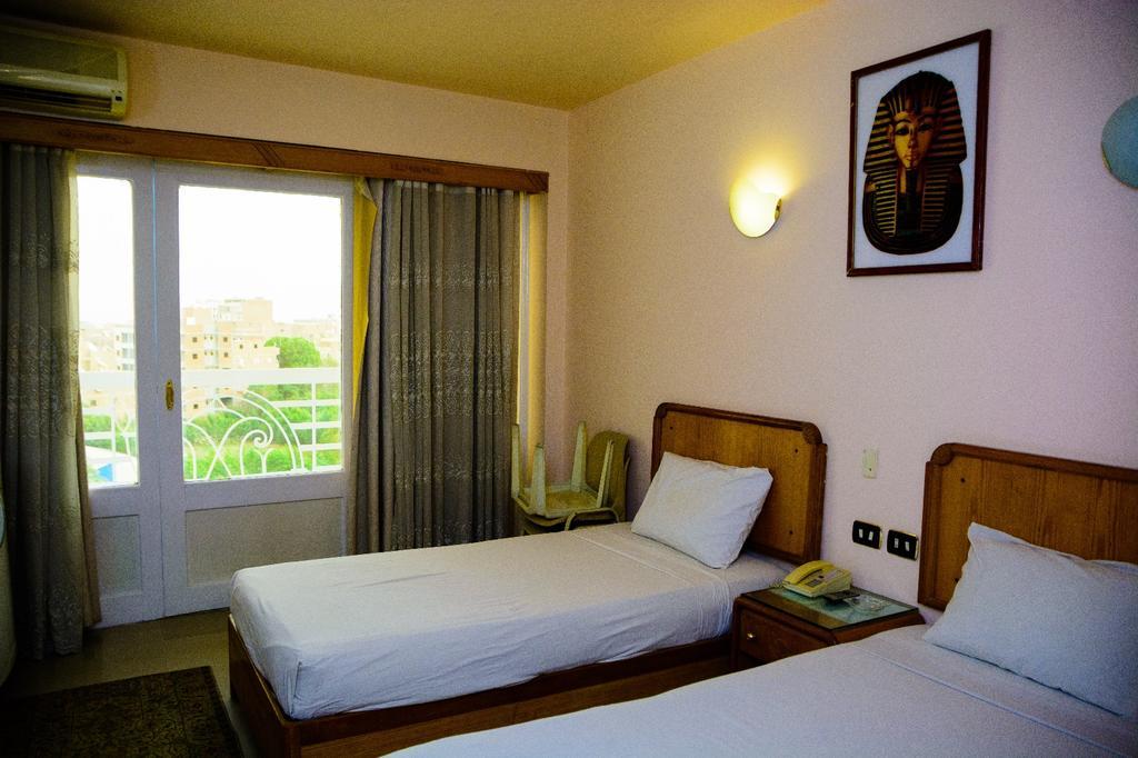 New Pola Hotel Луксор Экстерьер фото
